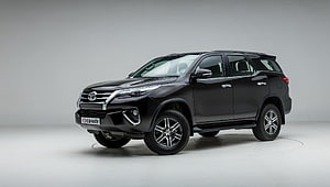 Black Toyota Fortuner SUV Studio Shot HD wallpaper