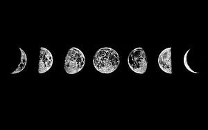 Black and White Moon Phases Sequence on Dark Background HD wallpaper