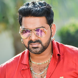 Pawan Singh in Red Shirt with Gold Aviator Sunglasses and Chain Necklaces HD phone wallpaper
