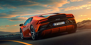 Orange Lamborghini Huracan Rear View on Desert Highway at Sunset HD wallpaper
