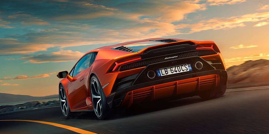 Orange Lamborghini Huracan Rear View on Desert Highway at Sunset HD wallpaper