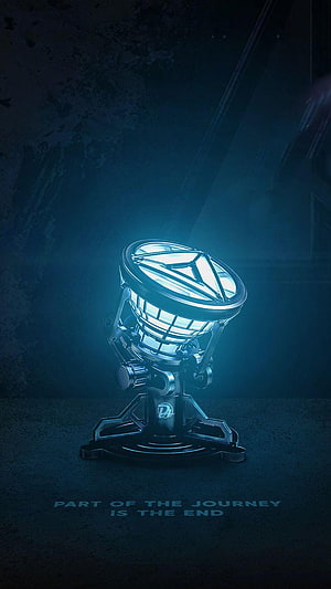 Glowing Arc Reactor Prop from Avengers Endgame on Dark Background HD phone wallpaper