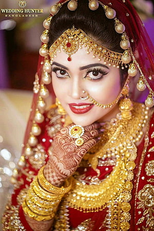 Bengali Bride in Traditional Red Lehenga with Gold Jewelry and Intricate Henna HD phone wallpaper