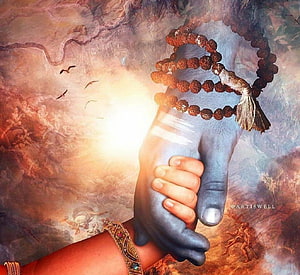 Divine Shiva Hand Holding Rudraksha Mala with Radiant Golden Light and Ethereal Clouds HD wallpaper