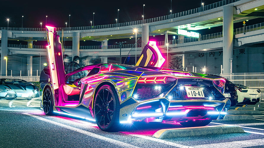 Lamborghini Aventador with Rainbow Chrome Wrap and Neon Underglow at Night HD wallpaper