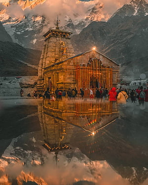 Kedarnath Temple at Golden Hour with Snow-Capped Himalayan Peaks and Reflections HD phone wallpaper