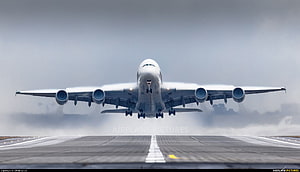 Airbus A380 Heavyweight Jetliner Taking Off From Runway Under Overcast Sky HD wallpaper