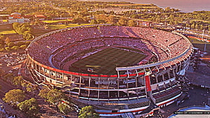 Aerial View of Sapporo Dome Stadium Filled with Fans for a Soccer Match HD wallpaper