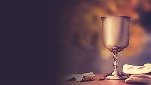 Silver Chalice and Matzah on Wooden Table with Autumn Leaves HD wallpaper
