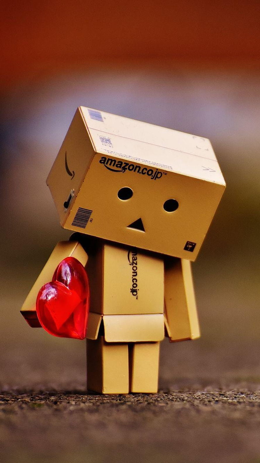 Danbo cardboard robot holding a red heart with amazon branding HD phone wallpaper