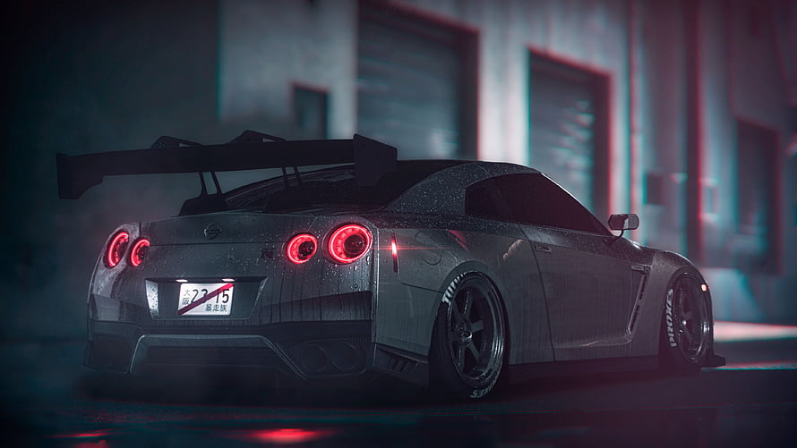 Nissan GT-R R35 Rear View with Large Carbon Wing in Dark Industrial Setting HD wallpaper