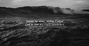 Moody Black and White Ocean Wave with Emotional Quote Text Overlay HD wallpaper