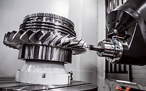 Precision CNC Machining of a Turbine Rotor in an Industrial Workshop HD wallpaper