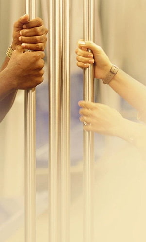 Jaanu Movie Still: Two Pairs of Hands Gripping Vertical Metal Bars in Warm Light HD phone wallpaper
