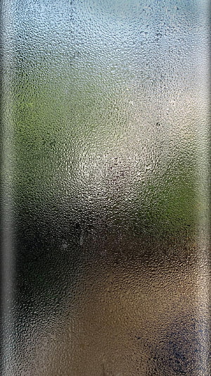Condensation Droplets on Frosted Glass Window with Blurred Green Background HD phone wallpaper