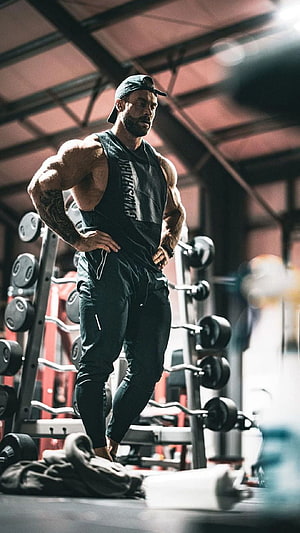 Muscular Man in Gymshark Tank Top Standing in Weight Room, Gymshark, c bum HD phone wallpaper