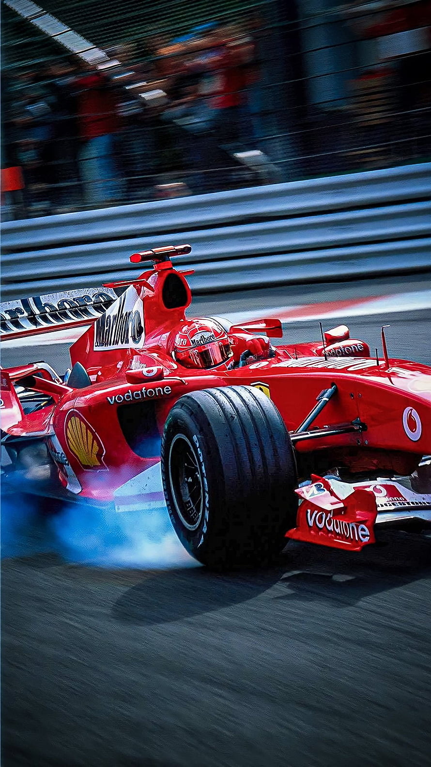 Ferrari F2004 Formula 1 Race Car with Schumacher Livery on Track HD phone wallpaper