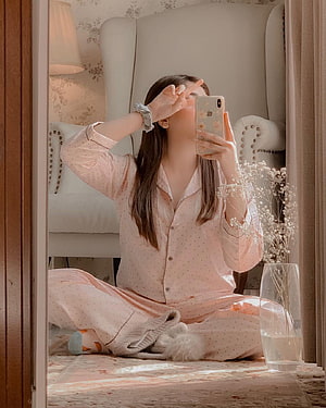 Woman in Pink Polka Dot Pajamas Taking a Mirror Selfie in a Cozy Bedroom, Stylish Girl Hidden Face DP with Mobile , girl mobile hidden face HD phone wallpaper