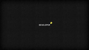Minimalist Developer Text on Dark Textured Background HD wallpaper