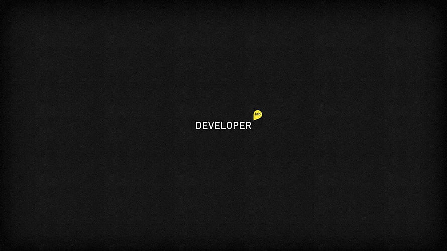 Minimalist Developer Text on Dark Textured Background HD wallpaper