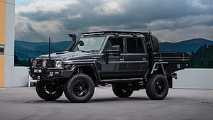Black Land Cruiser 79 Series Utility Truck with Off-Road Modifications HD wallpaper