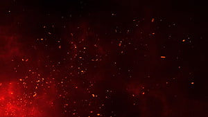 Glowing Red Embers and Sparks Floating in Dark Smoke Atmosphere HD wallpaper