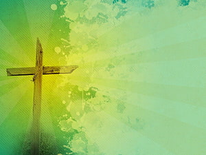 Rustic Wooden Cross Against Radiant Green and Yellow Light Burst HD wallpaper