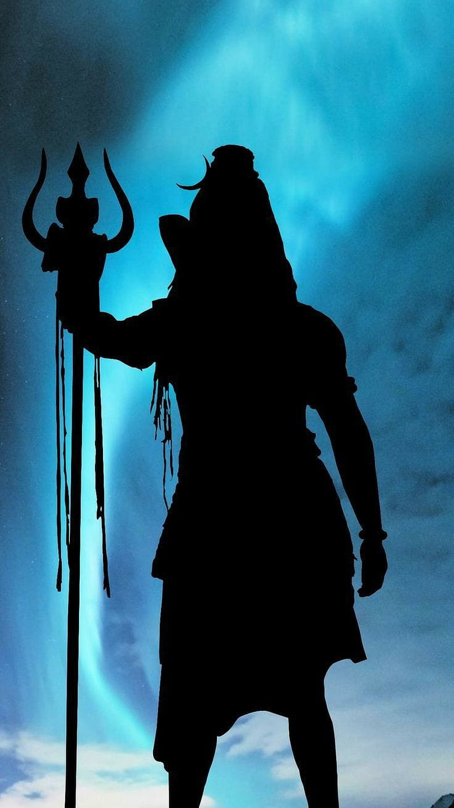 Silhouette of a Warrior Holding a Trishula Against a Blue Sky HD phone wallpaper