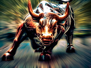 Aggressive Bronze Bull Statue with Motion Blur and Dramatic Lighting HD wallpaper
