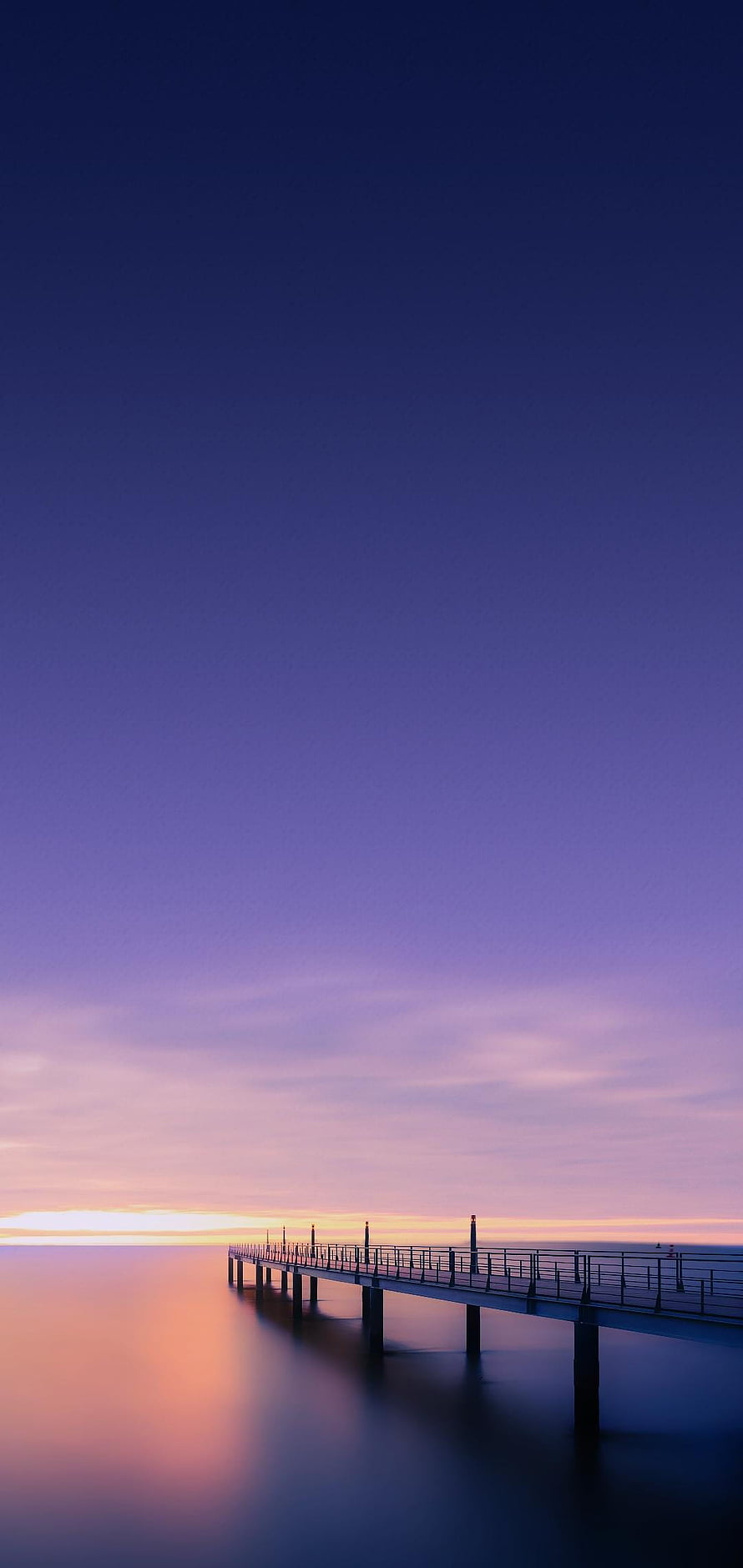 Serene Long Exposure Pier at Twilight with Purple and Orange Sky Gradient HD phone wallpaper