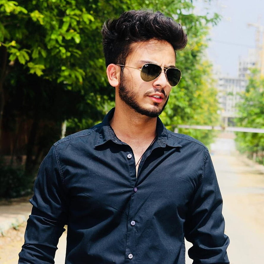 Elvish Yadav in Black Shirt and Aviator Sunglasses HD phone wallpaper