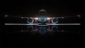 Boeing 737 Max Front View on Illuminated Runway at Night HD wallpaper