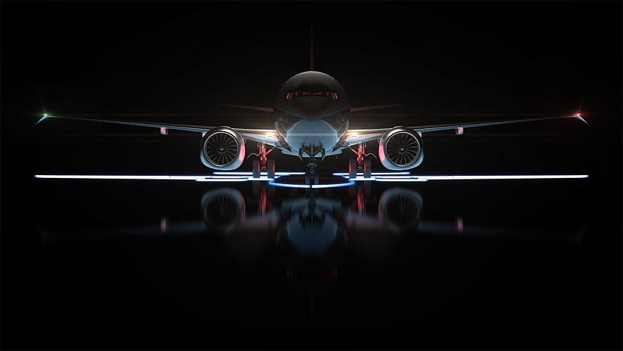 Boeing 737 Max Front View on Illuminated Runway at Night HD wallpaper