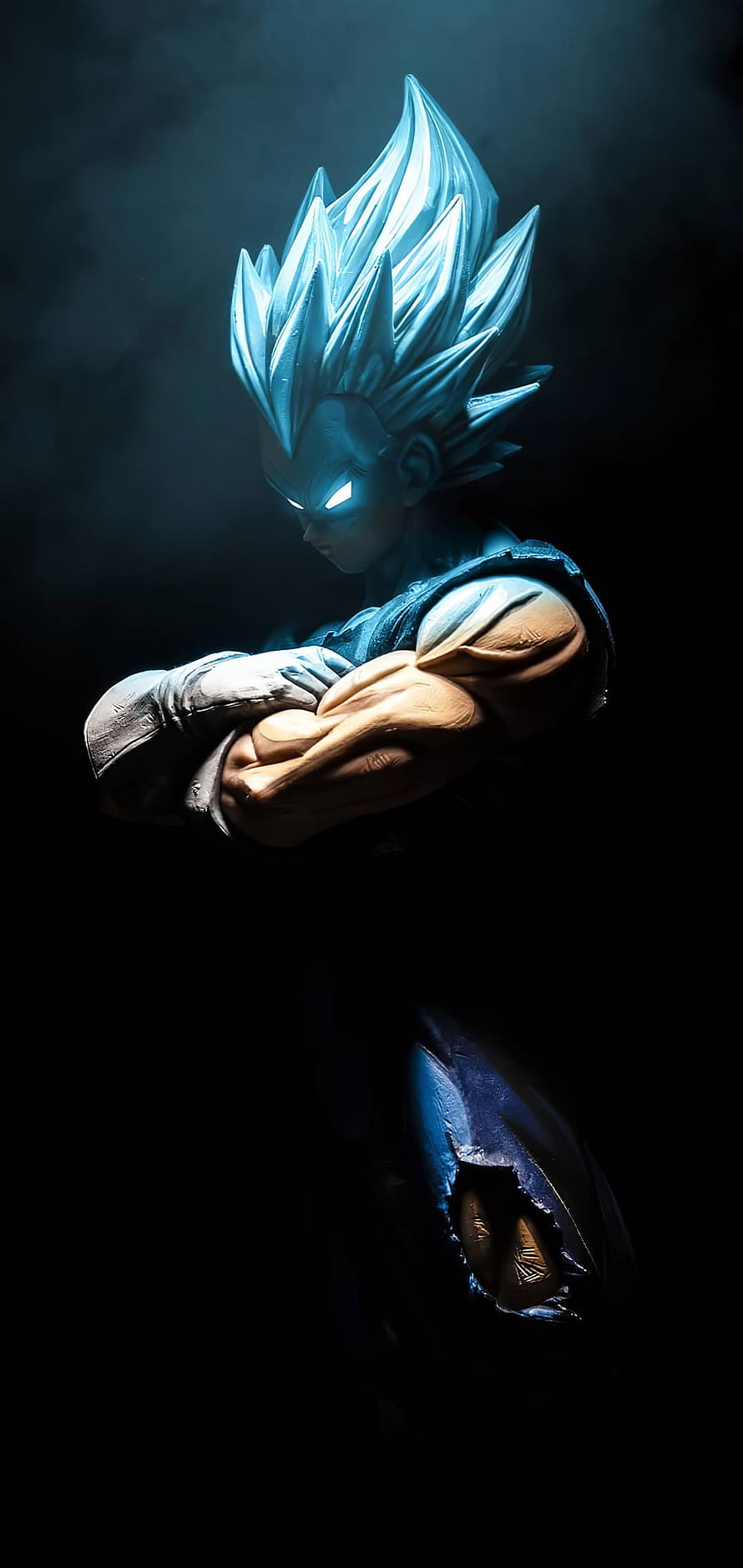 Goku Super Saiyan Blue Statue with Glowing Eyes and Crossed Arms in Dark Atmosphere HD phone wallpaper