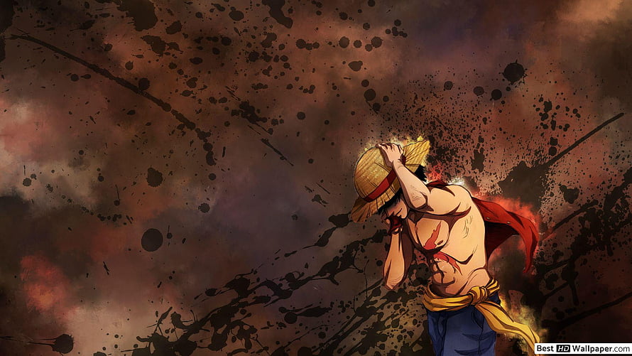 Luffy from One Piece in a dramatic battle scene with ink splatter background HD wallpaper