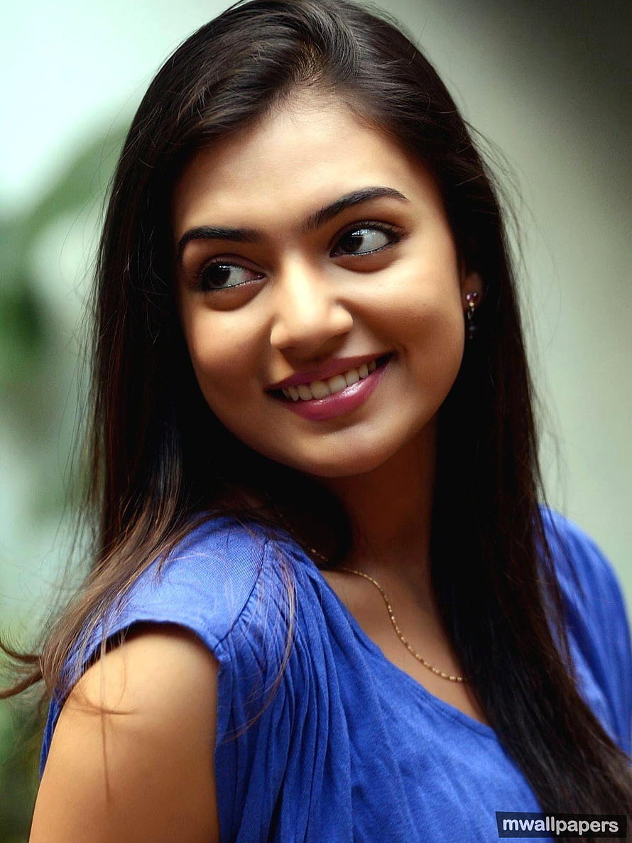 Nazriya Nazim smiling portrait in a blue top with long dark hair HD phone wallpaper