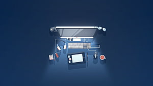 Top View of Digital Workspace with Computer, Graphics Tablet, and Headphones on Blue Background HD wallpaper