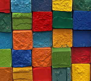 Vibrant Textured Colorful Chalk Blocks Arranged in a Grid Pattern HD wallpaper