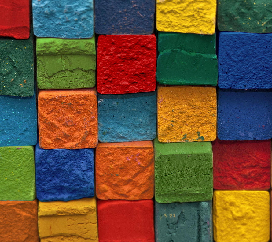 Vibrant Textured Colorful Chalk Blocks Arranged in a Grid Pattern HD wallpaper