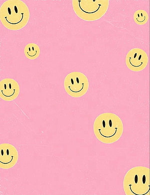 Cute Yellow Smiley Face Pattern on Soft Pink Background HD phone wallpaper