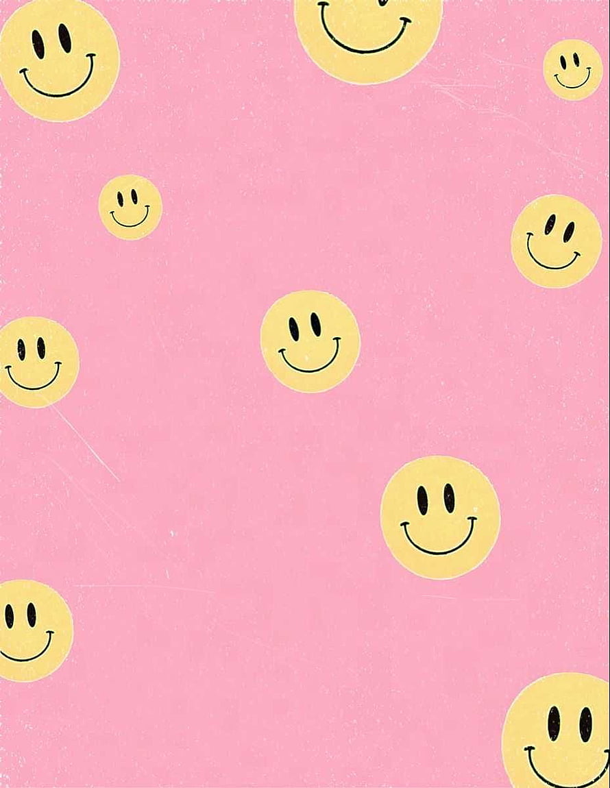 Cute Yellow Smiley Face Pattern on Soft Pink Background HD phone wallpaper