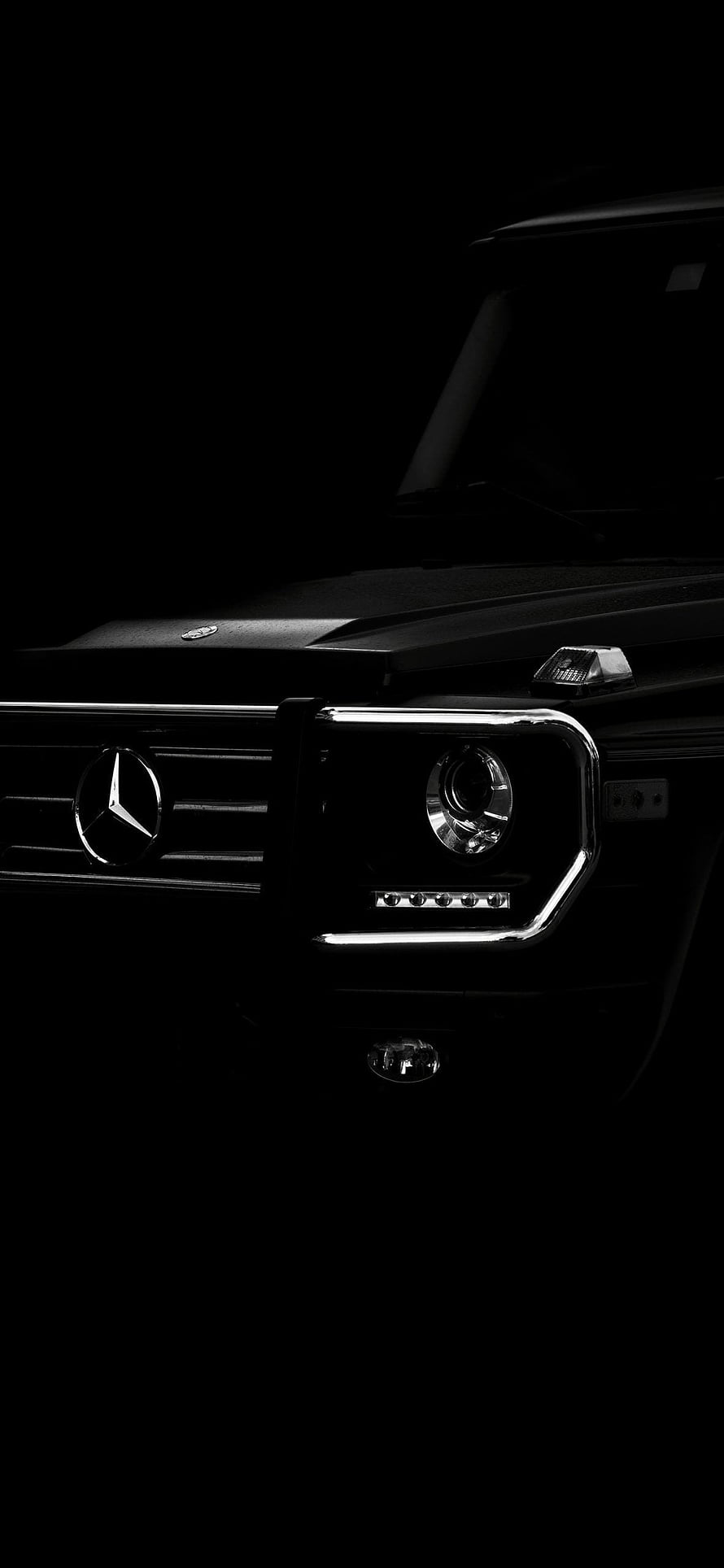 Mercedes-AMG G63 Front Grille and Headlight Detail in Dark Studio Lighting HD phone wallpaper