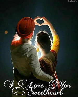 Indian couple making heart shape with hands in traditional attire HD phone wallpaper
