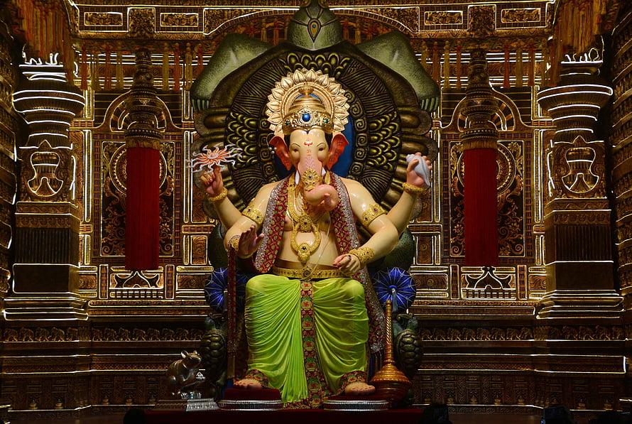 Lalbaugcha Raja Ganesha Murti in Ornate Temple Setting HD wallpaper