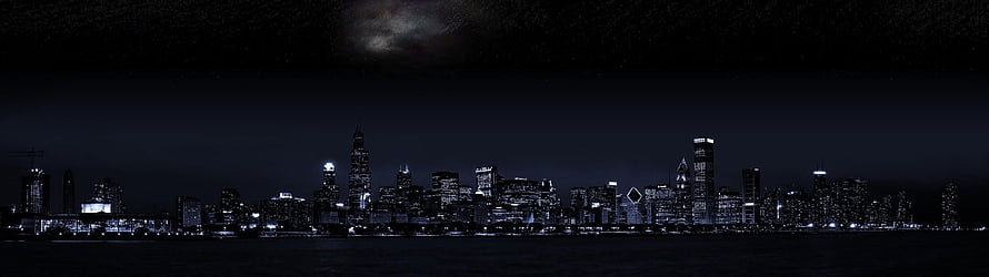 Chicago Skyline at Night with Moonlit Clouds Over Lake Michigan HD wallpaper