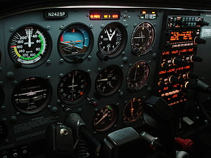 Cessna 172SP Cockpit Instrument Panel with Analog Gauges and Digital Displays HD wallpaper