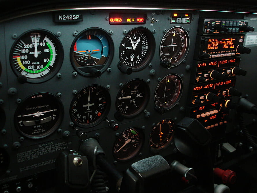 Cessna 172SP Cockpit Instrument Panel with Analog Gauges and Digital Displays HD wallpaper