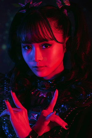 Moa Kikuchi in Dramatic Red and Blue Neon Lighting with Elaborate Stage Costume HD phone wallpaper