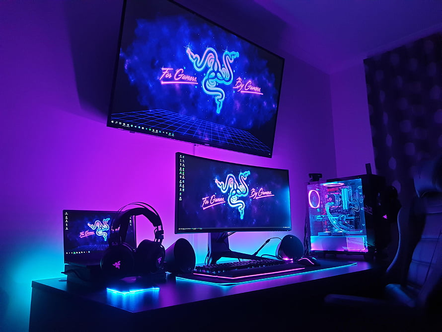 Razer Neon Gaming Battlestation with RGB PC Build and Triple Monitor Array HD wallpaper