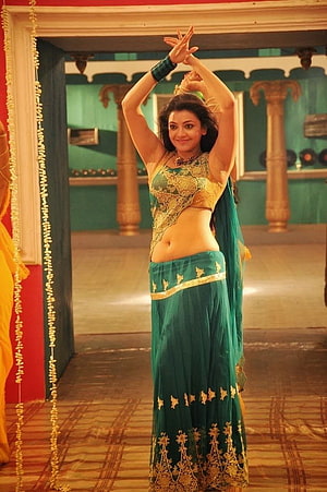 Kajal Agarwal in Traditional Green and Gold Dance Costume HD phone wallpaper